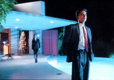 She is totally going to push him in the pool